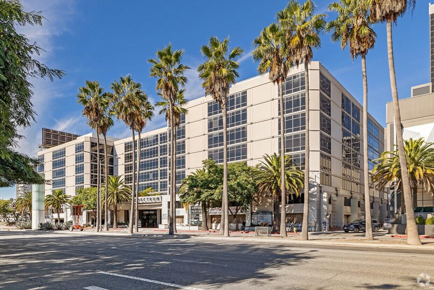Airport Spectrum exterior on Century Boulevard, sourced from the provided listing/flyer media.